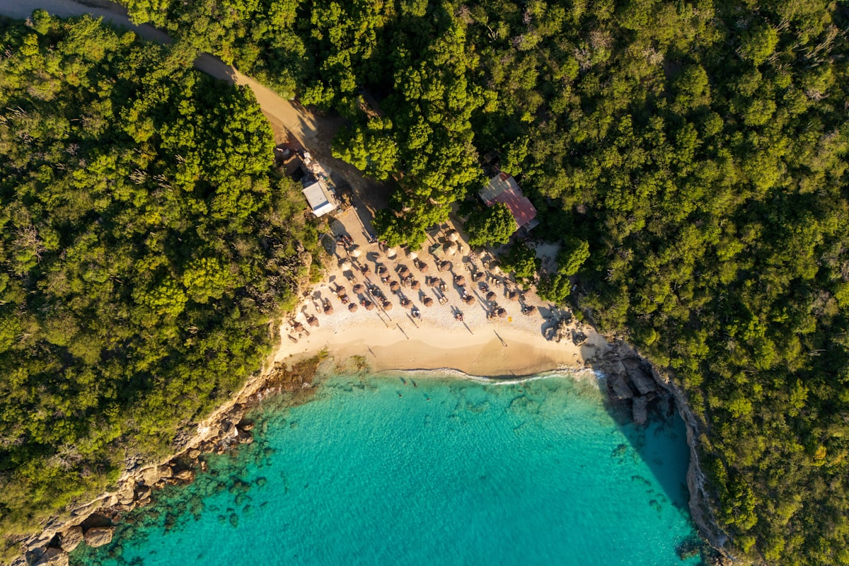 Aerial view of turquoise bay and white sand